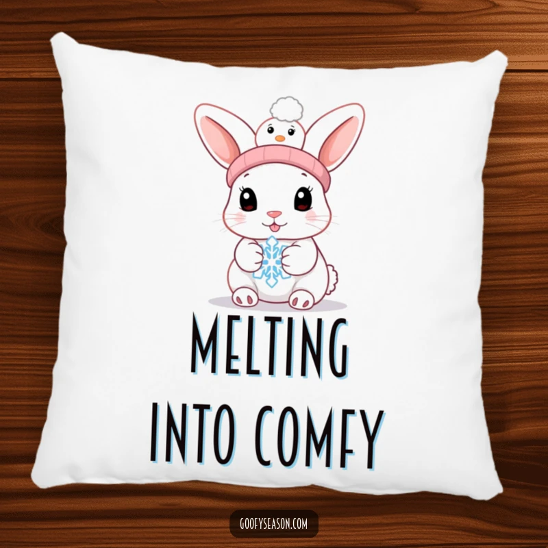 Funny bunny with a snowman hat holding a melting snowflake on a decorative pillow, soft and humorous.
