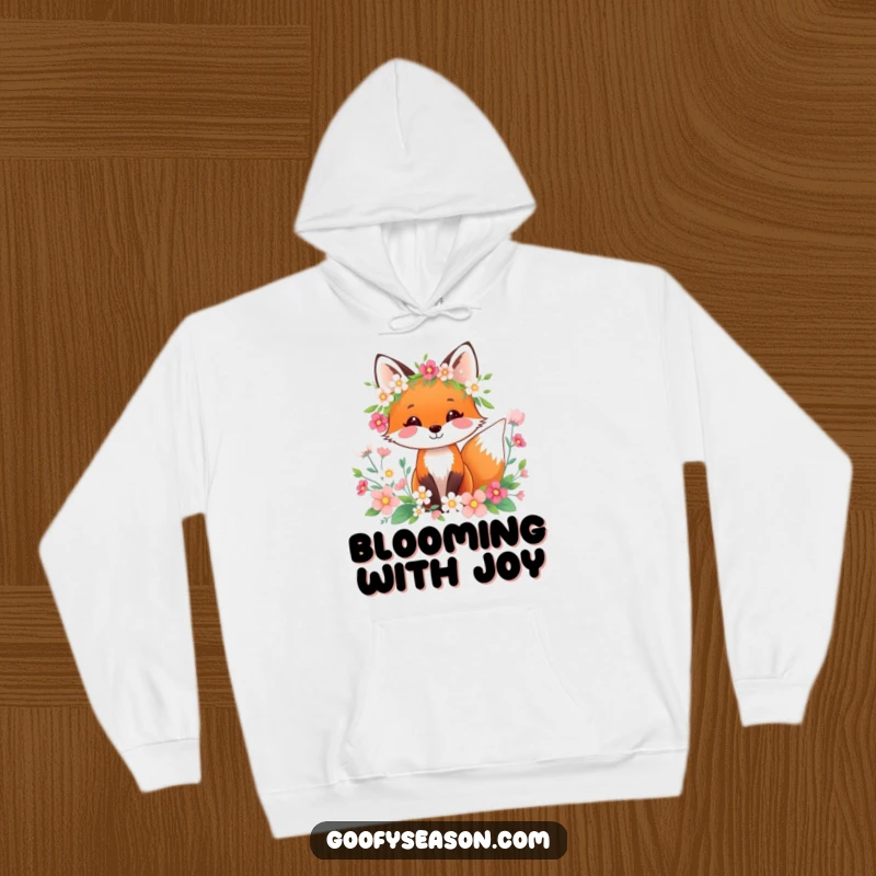 Funny happy fox in a spring wreath surrounded by flowers on a cozy hoodie, perfect for spring.