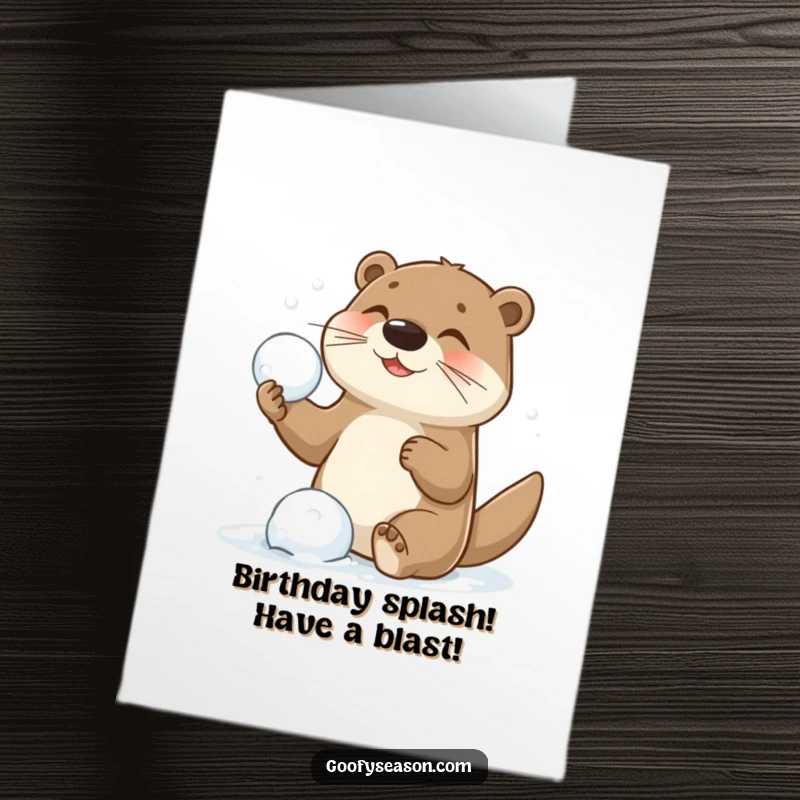 Funny Free Printable Birthday Card: Playful otter gleefully throws a snowball, ready for birthday battles.