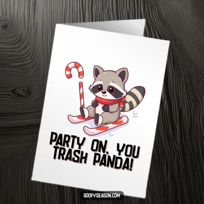 Funny free printable birthday card showing a playful raccoon zooming down a hill made of giant candy canes.