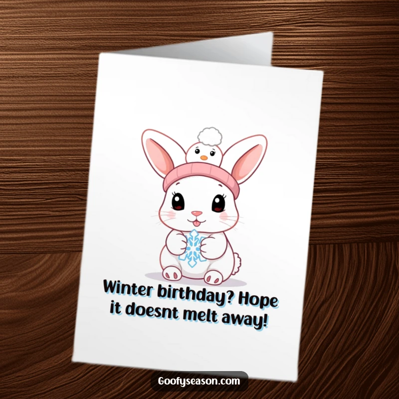 Funny Free Printable Birthday Card: Bunny in snowman hat struggles with melting snowflake, a comical winter wish.