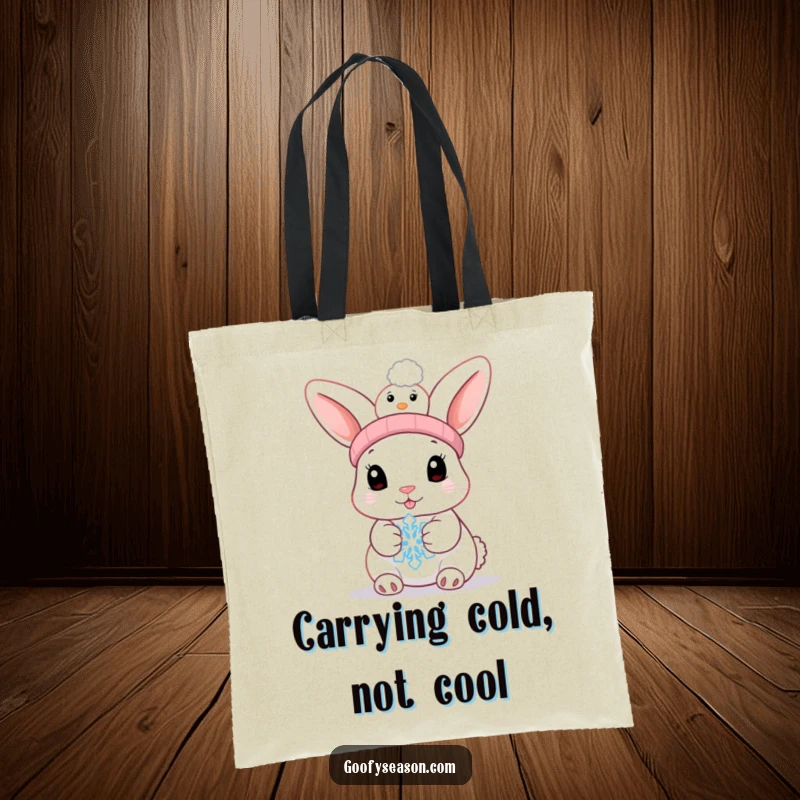 Funny bunny holding a melting snowflake on a tote bag, a cute and humorous winter accessory.