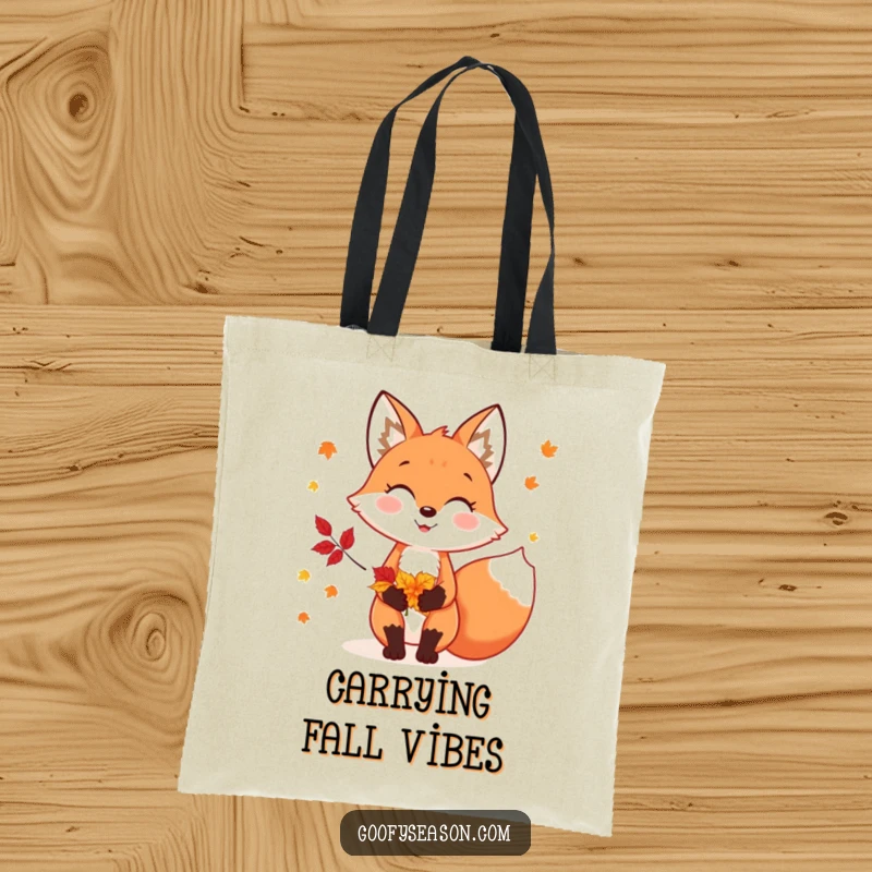 Funny tote bag featuring a cheerful fox character holding a bouquet of colorful autumn leaves, celebrating fall.